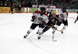 Action during a hockey game against the University of Minnesota, St. Cloud State University